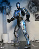 Neca - Action Figure Ultimate Battle Damaged RoboCop with Chair 18 cm