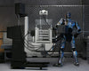 Neca - Action Figure Ultimate Battle Damaged RoboCop with Chair 18 cm